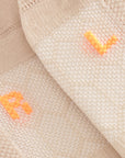 Cuera 2-Pack Grip Socks in Sand, neck label and care tag detail