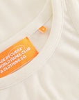 Cuera Active Rib Tank Top in Off White, neck label and care tag detail
