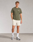 Model wearing Cuera Oncourt Army/Off White Uniform Bundle, front studio view