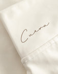 Cuera Oncourt Cuera Skirt 2-in-1 in Off White, logo print detail
