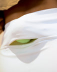 Model wearing Cuera Oncourt Cuera Skirt 2-in-1 in Off White, close-up detail on model