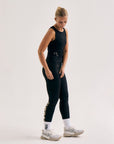 Model wearing Cuera Zip Cardigan & Tights Long in Black Bundle, front studio view