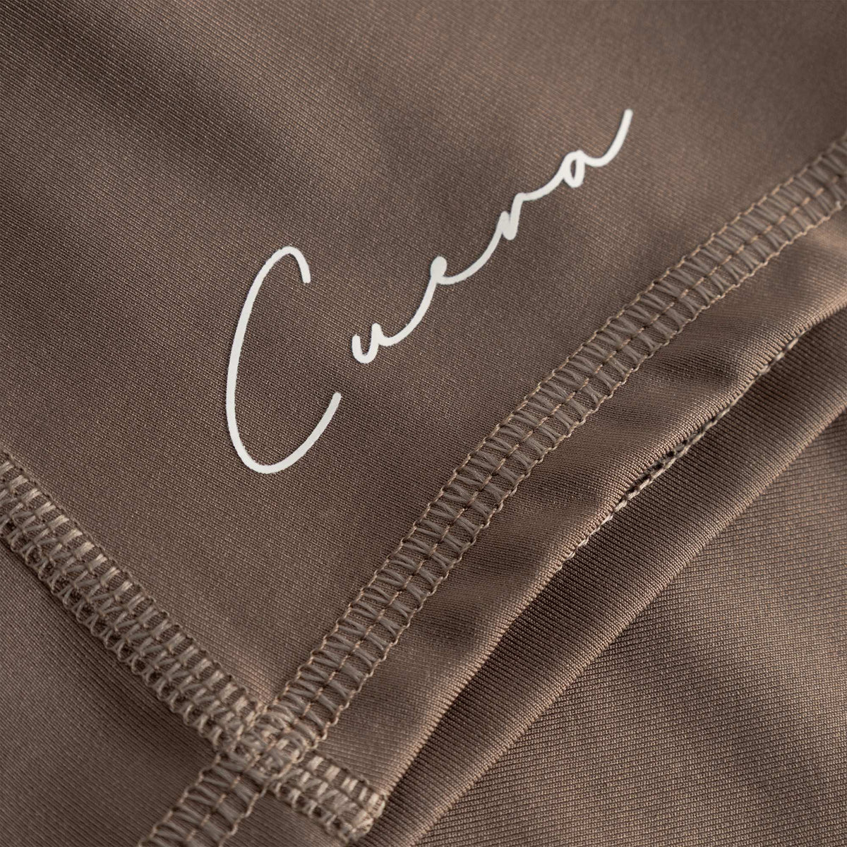 Cuera Active Biker Tights Hidden Seem in Walnut, logo print detail