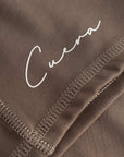 Cuera Active Biker Tights Hidden Seem in Walnut, logo print detail