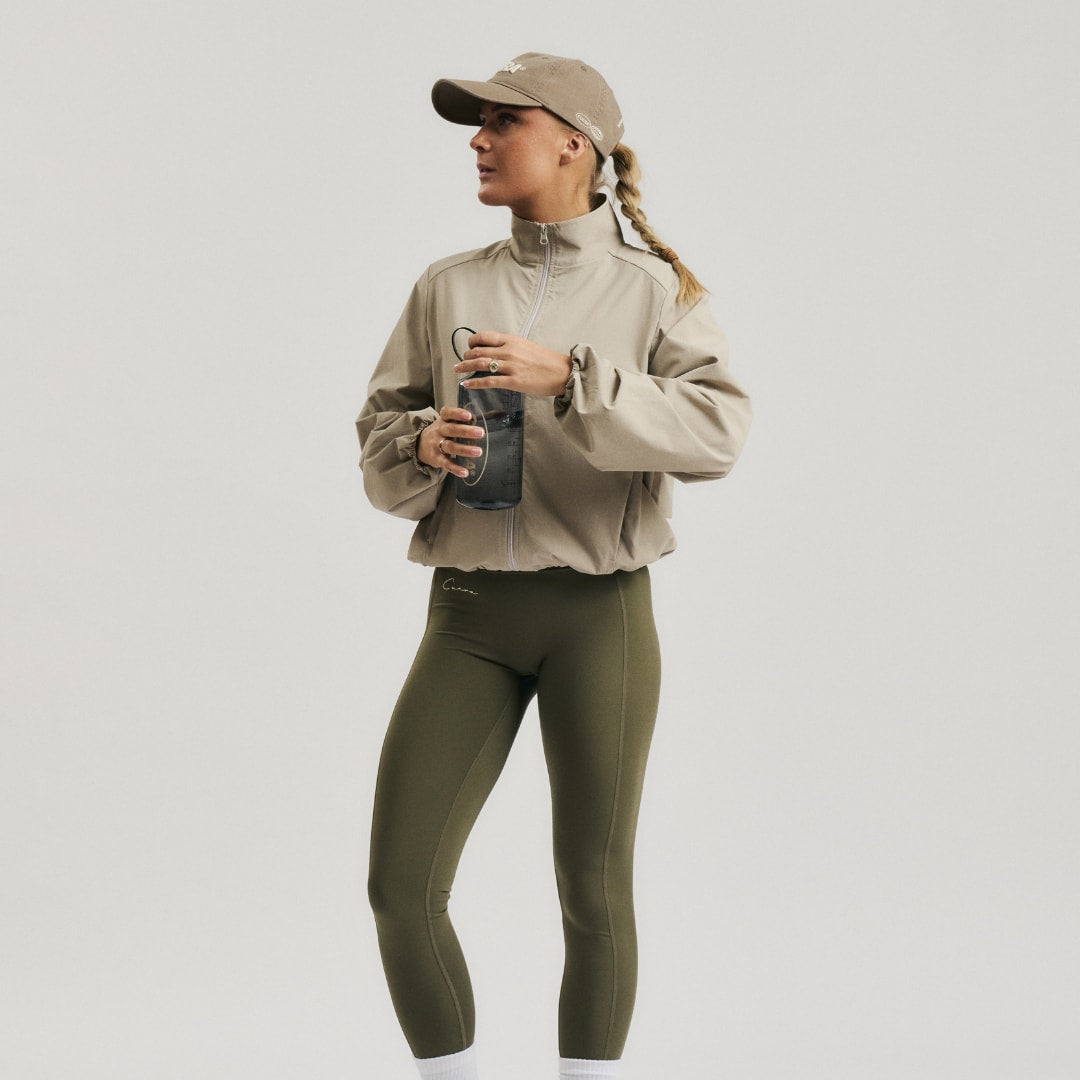 Cuera Active Cuera Short Jacket in Taupe, flat lay back view