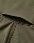Model wearing Cuera Active Cuera Tights Hidden Front Seem in Army, front studio view