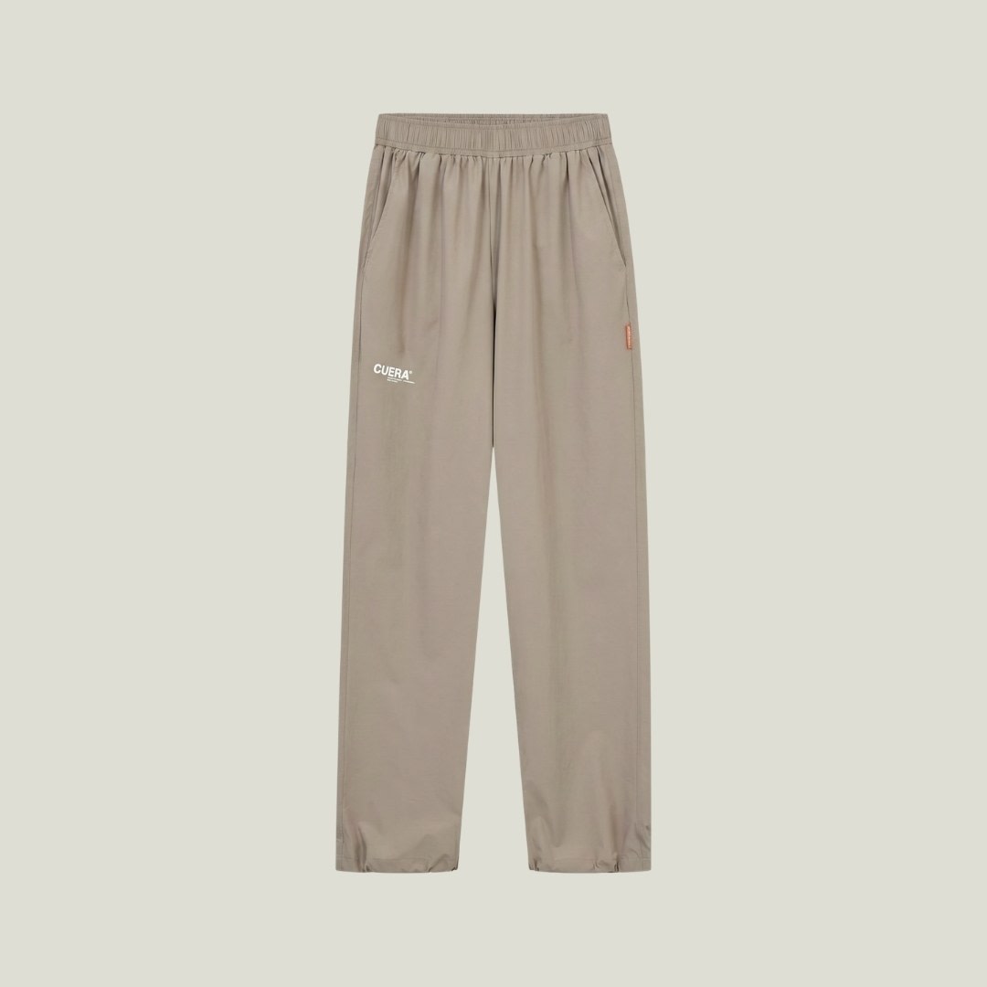Cuera Active Cuera Track Pants in Taupe, flat lay front view