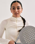 Model wearing Cuera Active Cuera Zip Cardigan in Off White, close-up detail on model