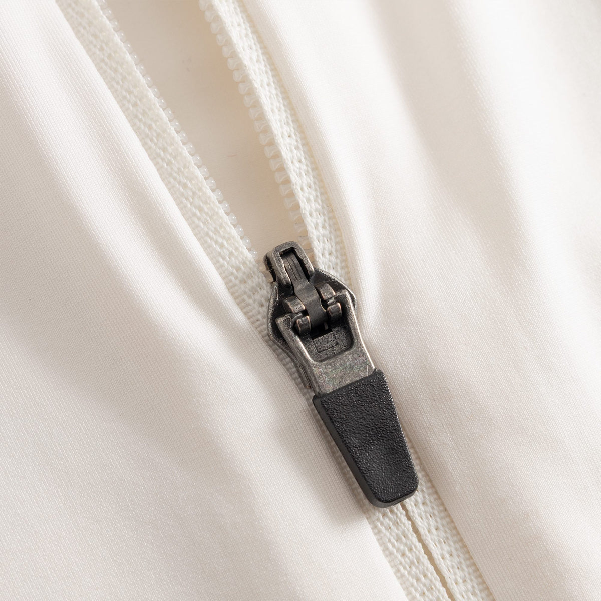 Cuera Active Cuera Zip Cardigan in Off White, zip and pocket detail