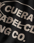 Made By Cuera logo print detail on the Active Made Bra in Black