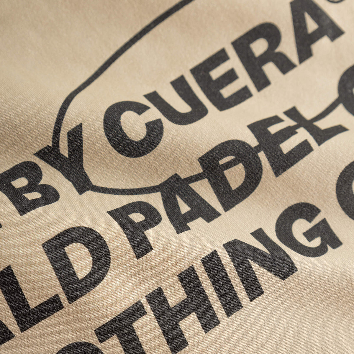 Made By Cuera logo print detail on the Active Made Bra in Grey