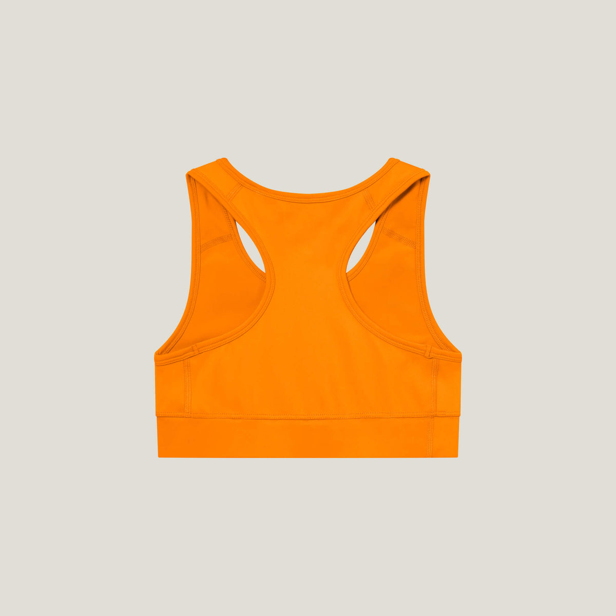 Cuera Active Made Bra in Orange, flat lay racerback view