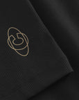 Cuera Active Rib Tank Top in Black, logo print detail