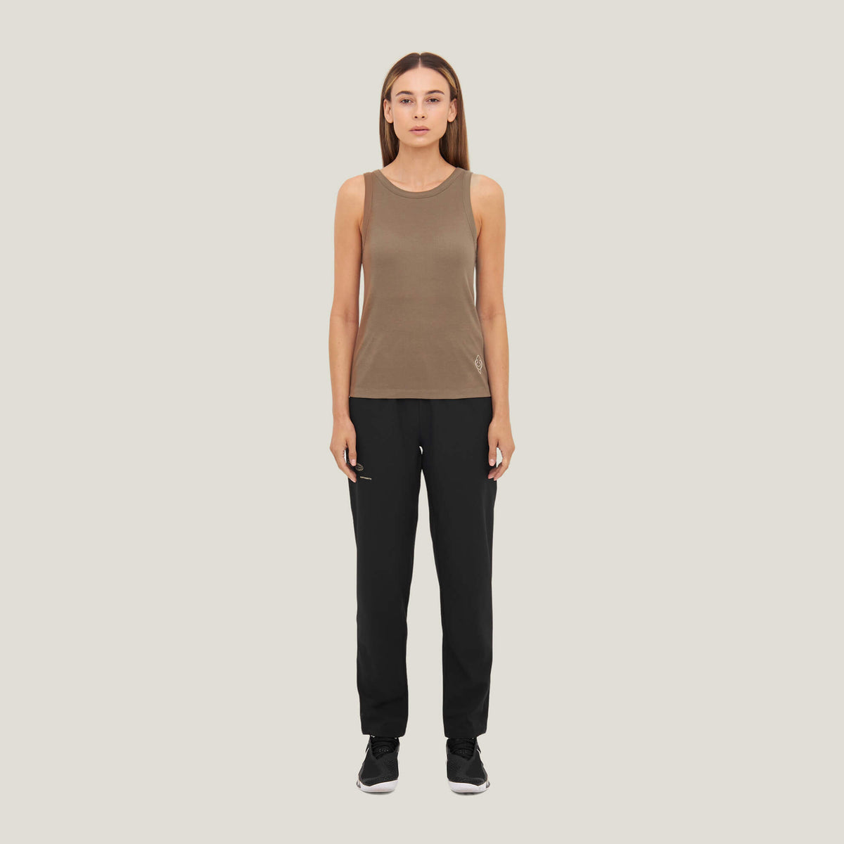Model wearing Cuera Active Rib Tank Top Bundle W&B, front studio view