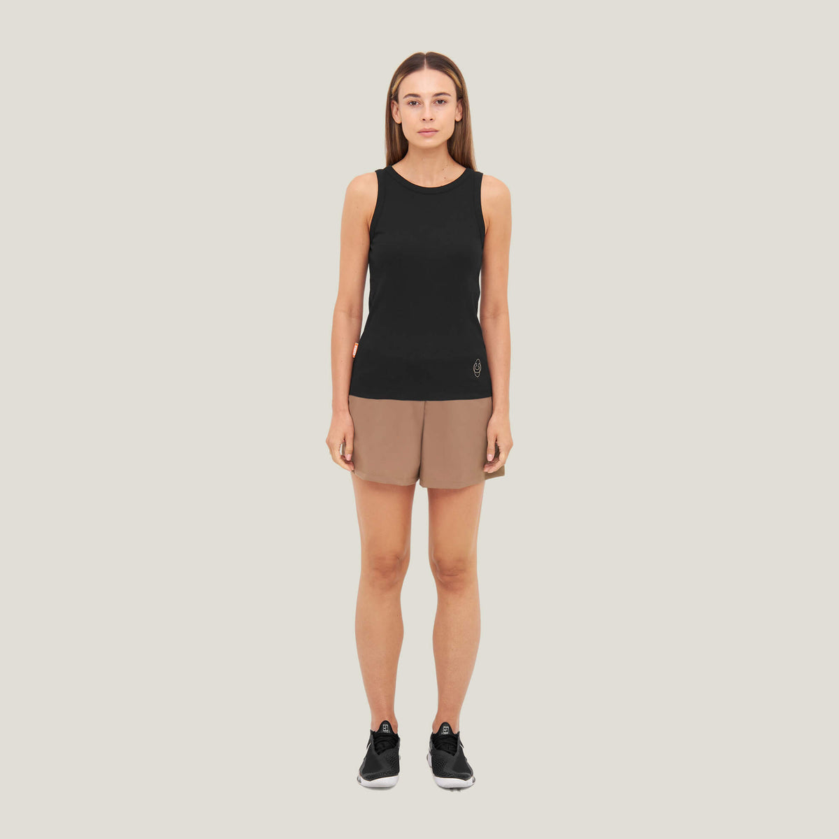 Model wearing Cuera Active Rib Tank Top Bundle W&B, front studio view