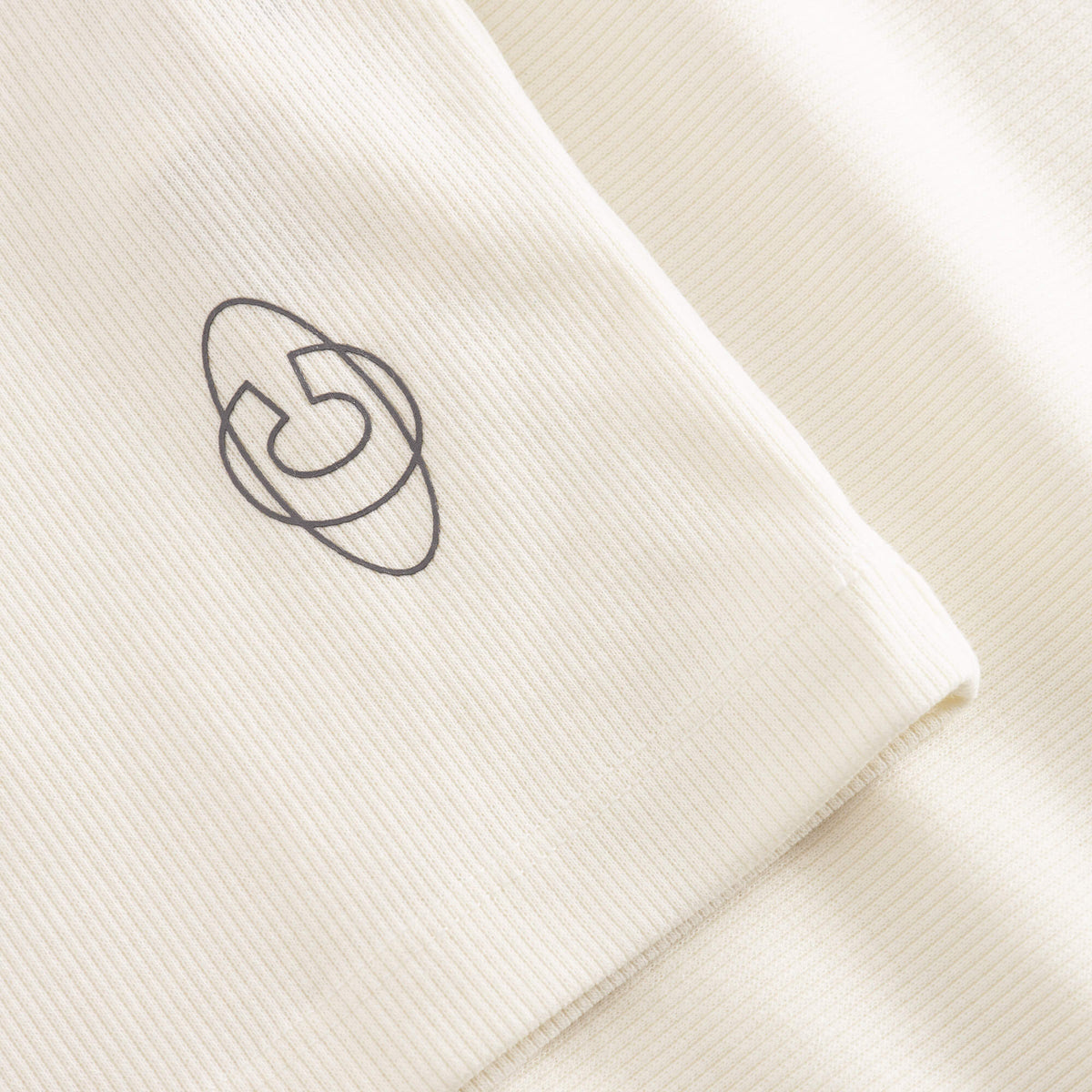 Cuera Active Rib Tank Top in Off White, logo print detail