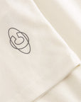 Cuera Active Rib Tank Top in Off White, logo print detail