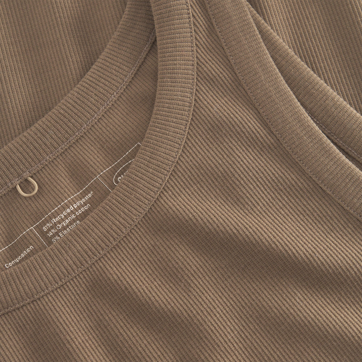 Cuera Active Rib Tank Top in Walnut, neck label and care tag detail