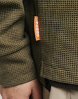 Cuera Active Structure Half Zip in Army, neck label and care tag detail