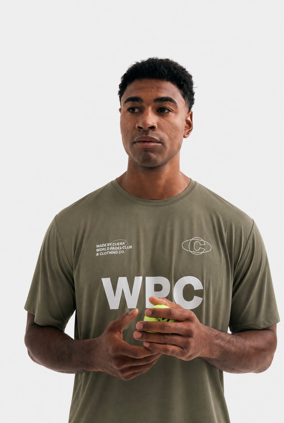 Model wearing Cuera Active WPC Light Weight T-Shirt in Army, front studio view