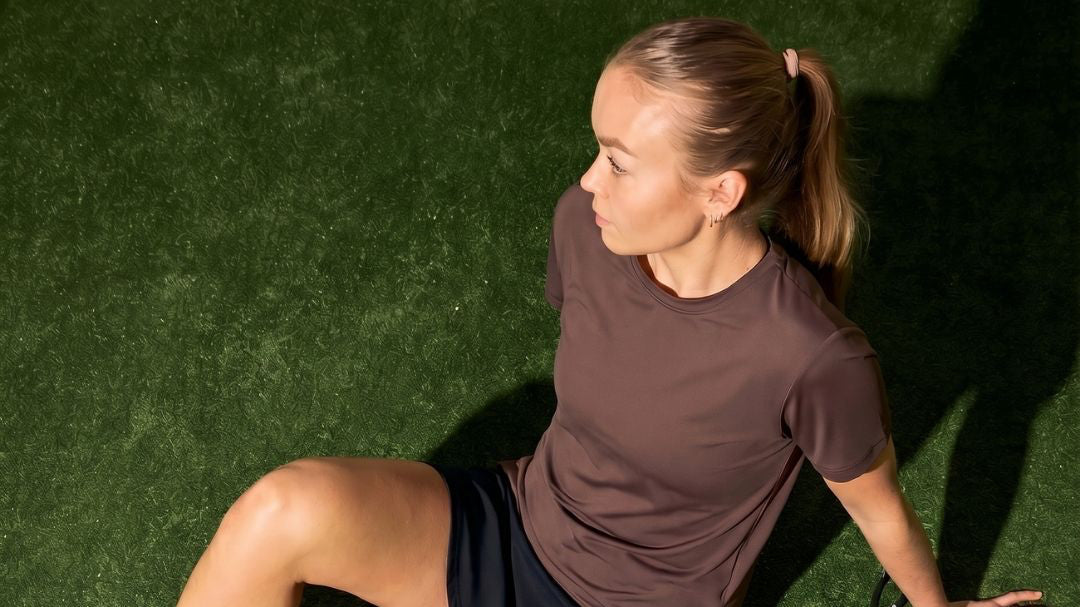 Model wearing Cuera DM2026 in Julia Wiese, lifestyle action shot on the padel court