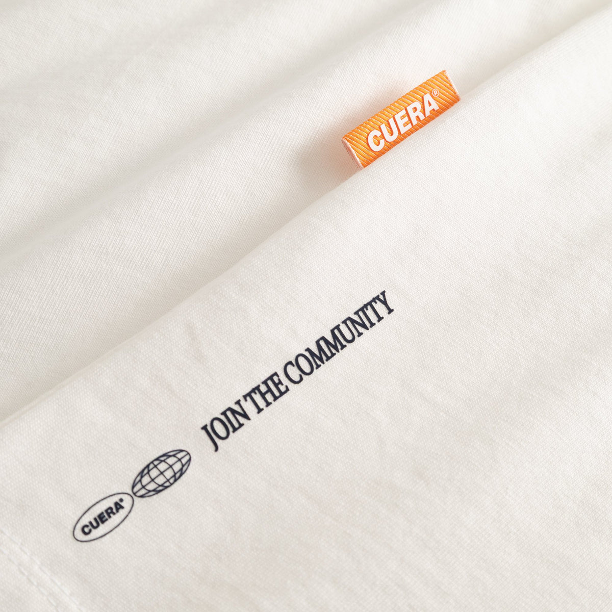 Cuera Offcourt Legacy Short Sleeve in Off White w. Navy, neck label and care tag detail