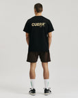 Model wearing Cuera Oncourt Breathe Cuera T-Shirt in Black, back studio view