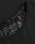 Cuera Oncourt Cropped Tank Top in Black, neck label and care tag detail
