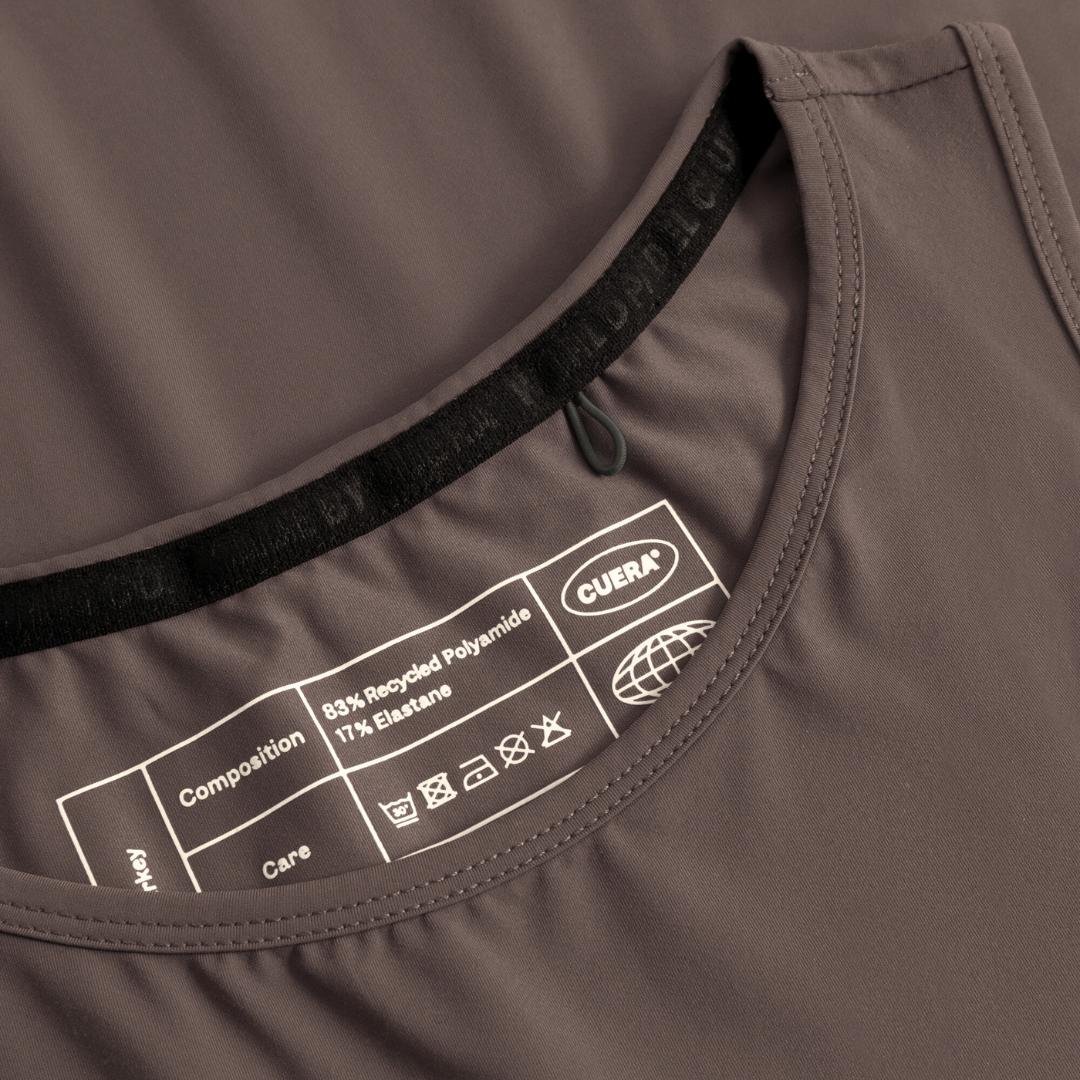 Cuera Oncourt Cropped Tank Top in Dark Brown, neck label and care tag detail