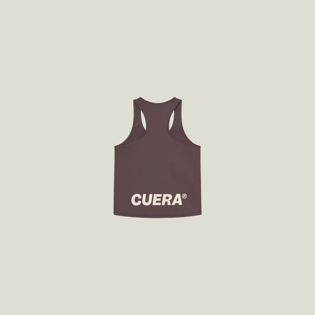 Model wearing Cuera Oncourt Cuera Airy Tank Top in Dark Brown, front studio view