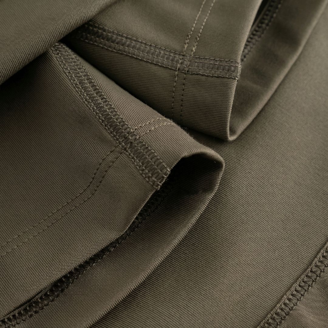 Cuera Oncourt Cuera Skirt 2-in-1 in Army, neck label and care tag detail