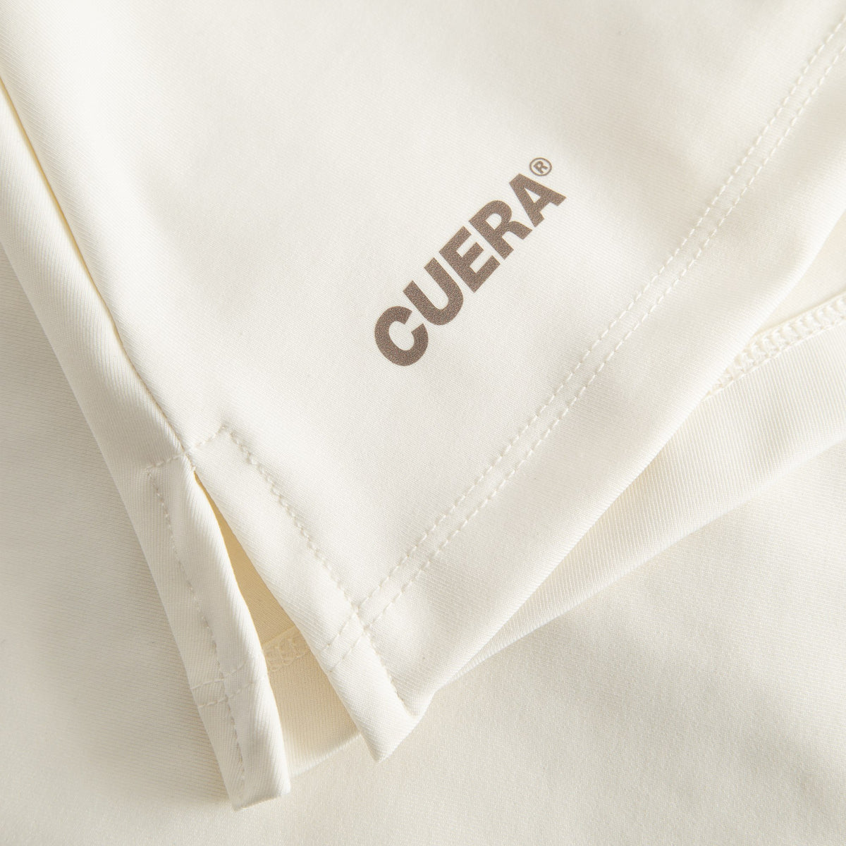 Cuera Oncourt Cuera Skirt 2-in-1 in Off White, logo print detail