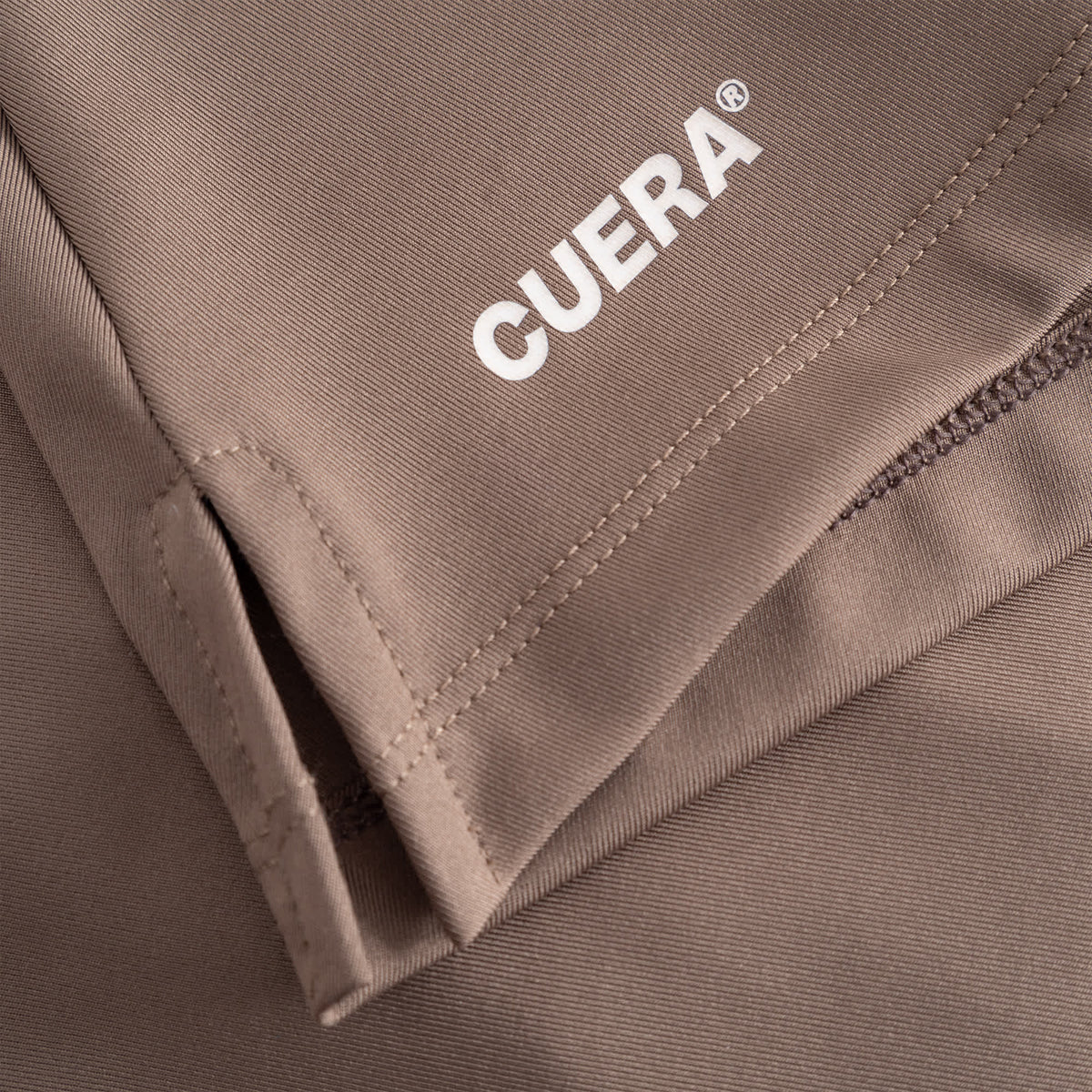 Cuera Oncourt Cuera Skirt 2-in-1 in Walnut, logo print detail