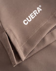 Cuera Oncourt Cuera Skirt 2-in-1 in Walnut, logo print detail
