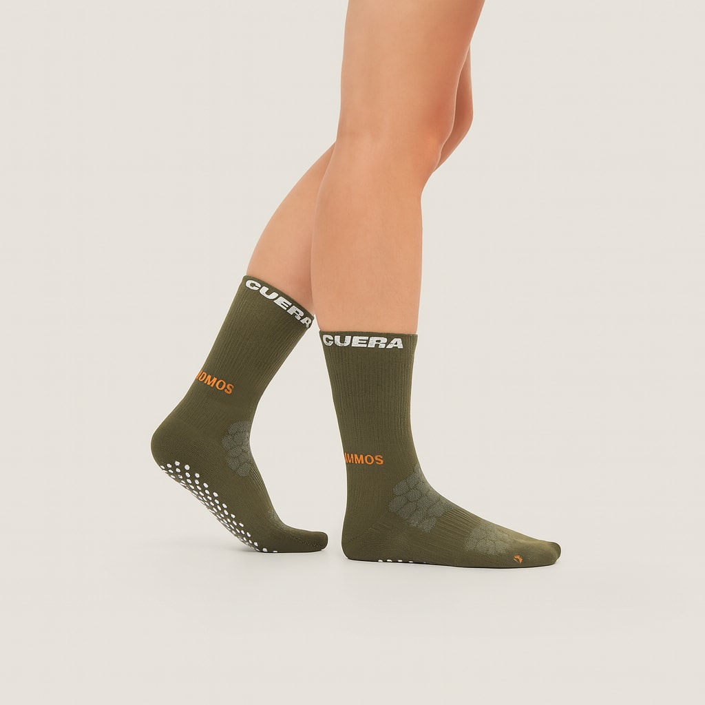 Model wearing Cuera Oncourt Grip Sock in Army, front studio view