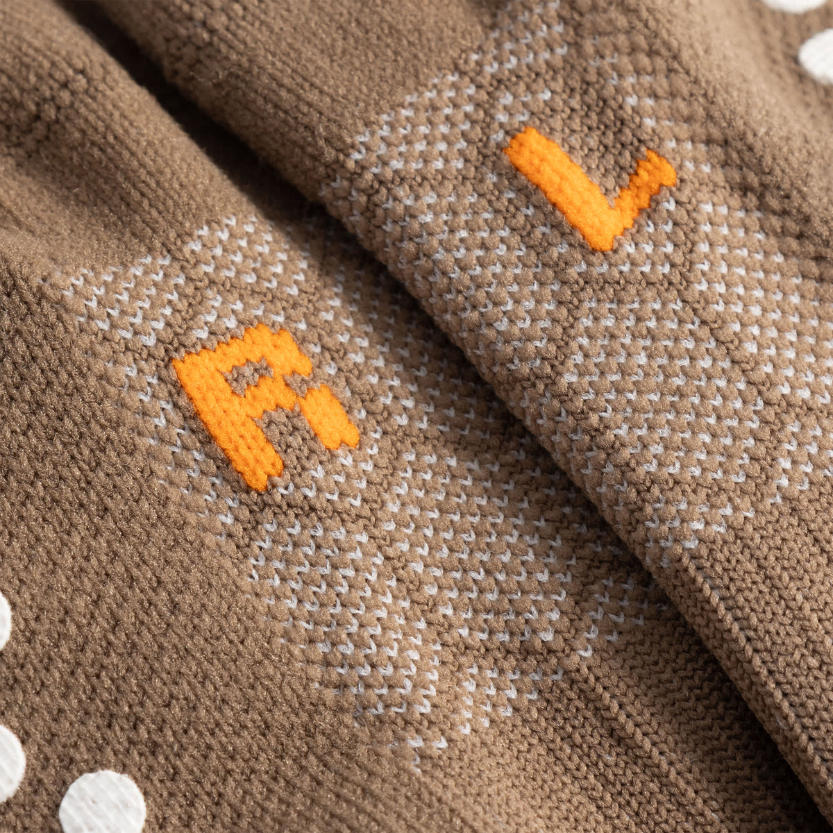 Cuera Oncourt Grip Sock in Walnut, neck label and care tag detail