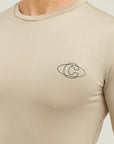 Model wearing Cuera Oncourt LS Layer T-Shirt in Sand, close-up detail on model