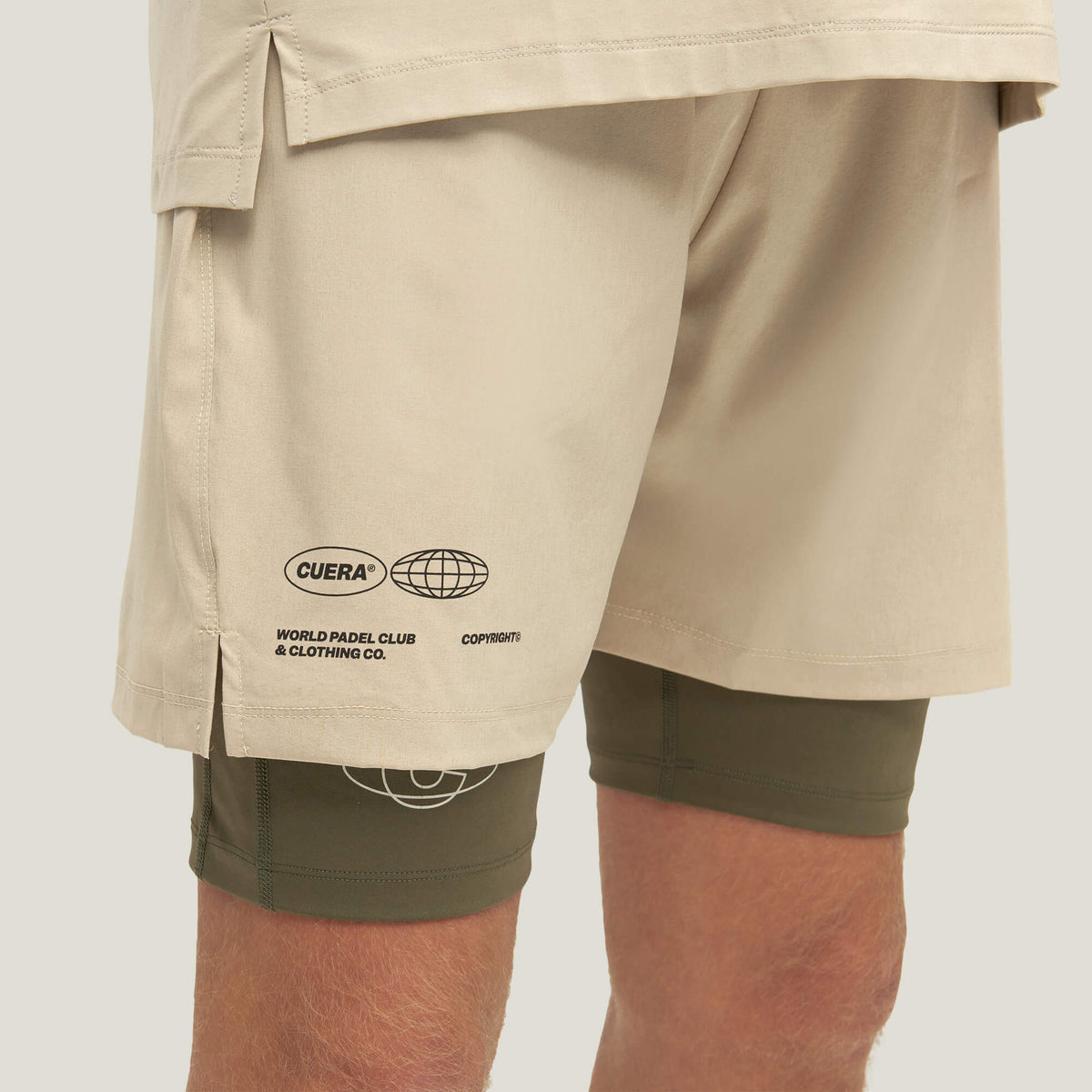 Model wearing Cuera Oncourt Sand Uniform, close-up detail on model