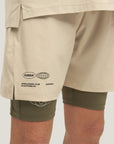 Model wearing Cuera Oncourt Sand Uniform, close-up detail on model
