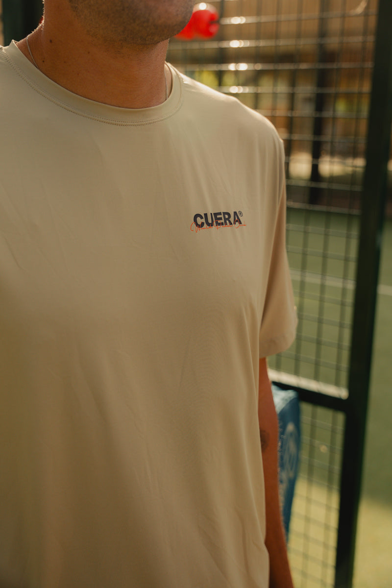 Model wearing Cuera Oncourt Sand Uniform, close-up detail on model