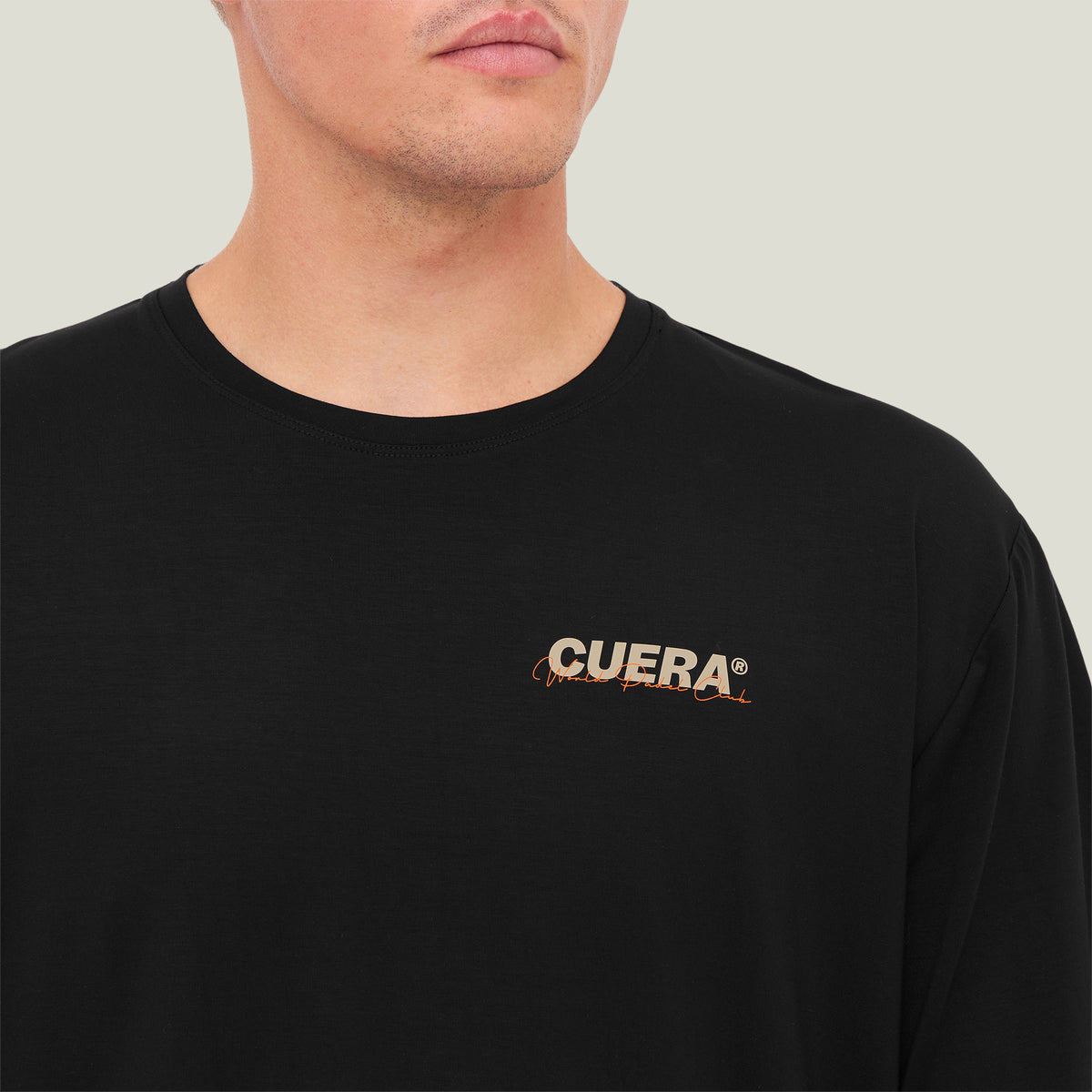 Model wearing Cuera Oncourt Shorts & Light Weight T-Shirt Army w. Black Bundle, front studio view