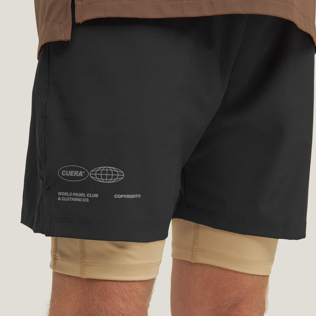 Model wearing Cuera Oncourt Shorts &amp; Light Weight T-Shirt  Black Bundle, close-up detail on model