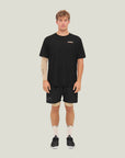 Model wearing Cuera Oncourt Shorts & Light Weight T-Shirt  Black Bundle, front studio view