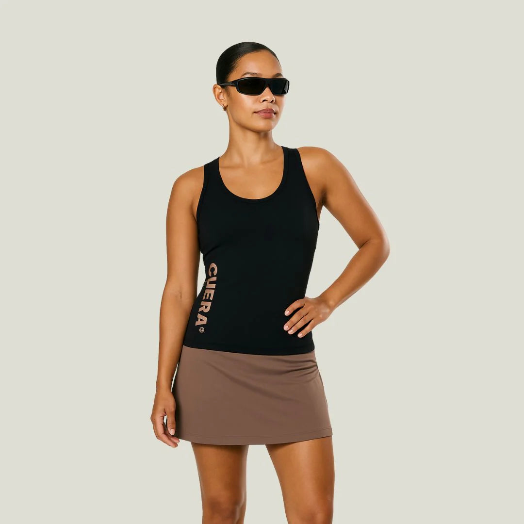 Model wearing Cuera Oncourt Black Slim Tank Top 2-pack, front studio view