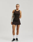 Model wearing Cuera Oncourt Slim Tank Top in Dark Brown, front studio view
