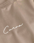 Cuera Oncourt Slim Tank Top in Walnut, logo print detail