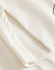 Cuera Oncourt Slit Top SS in Off White, seam and stitching detail