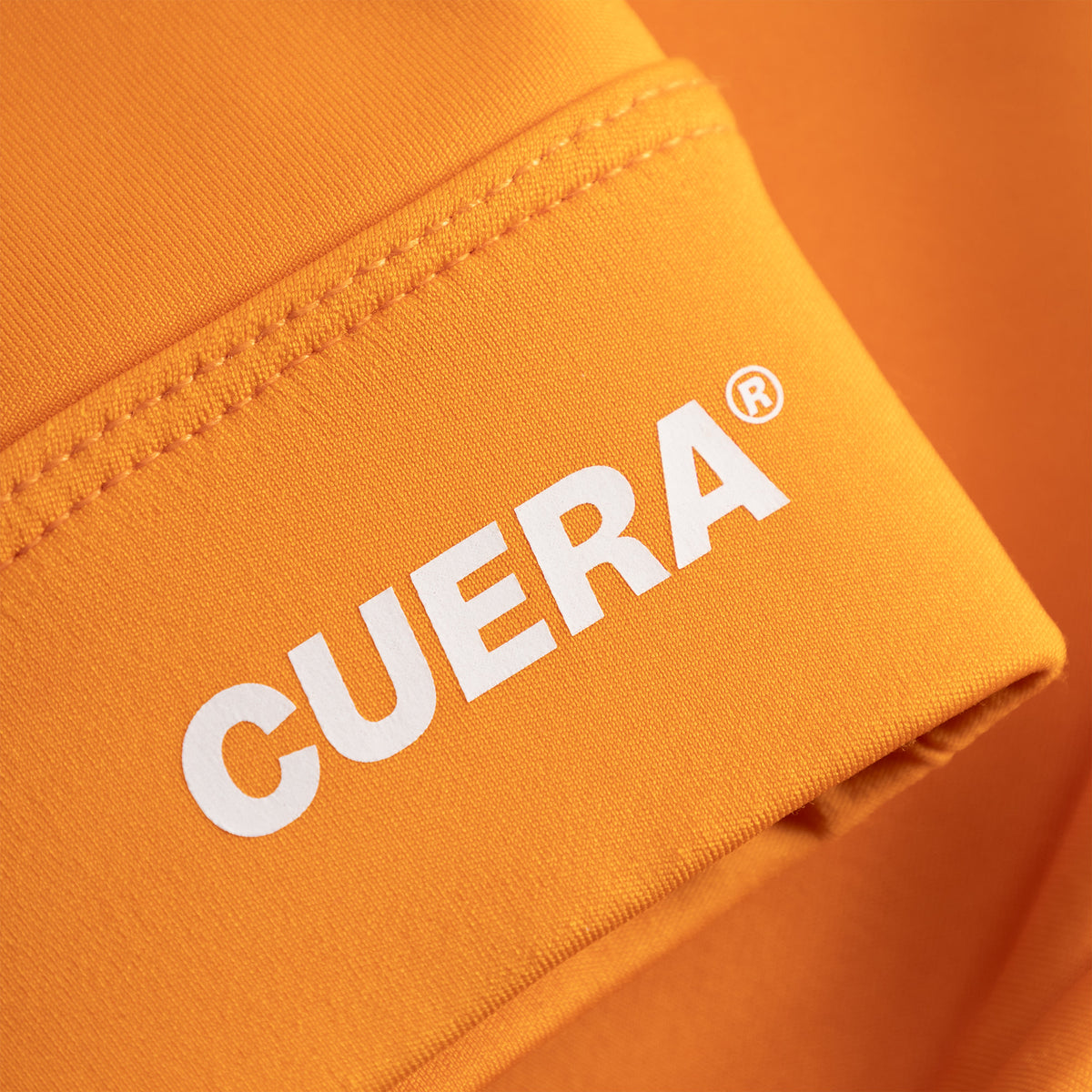 Cuera Oncourt Soft Bra Top in Orange, logo print detail
