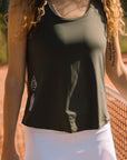 Model wearing Cuera Oncourt WPC Tank in Army, close-up detail on model