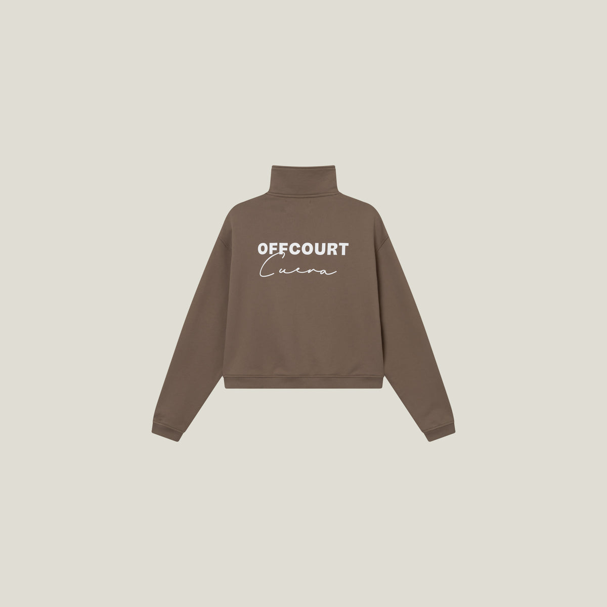 Model wearing Cuera Offcourt Cuera Half Zip Sweat in Walnut, close-up detail on model
